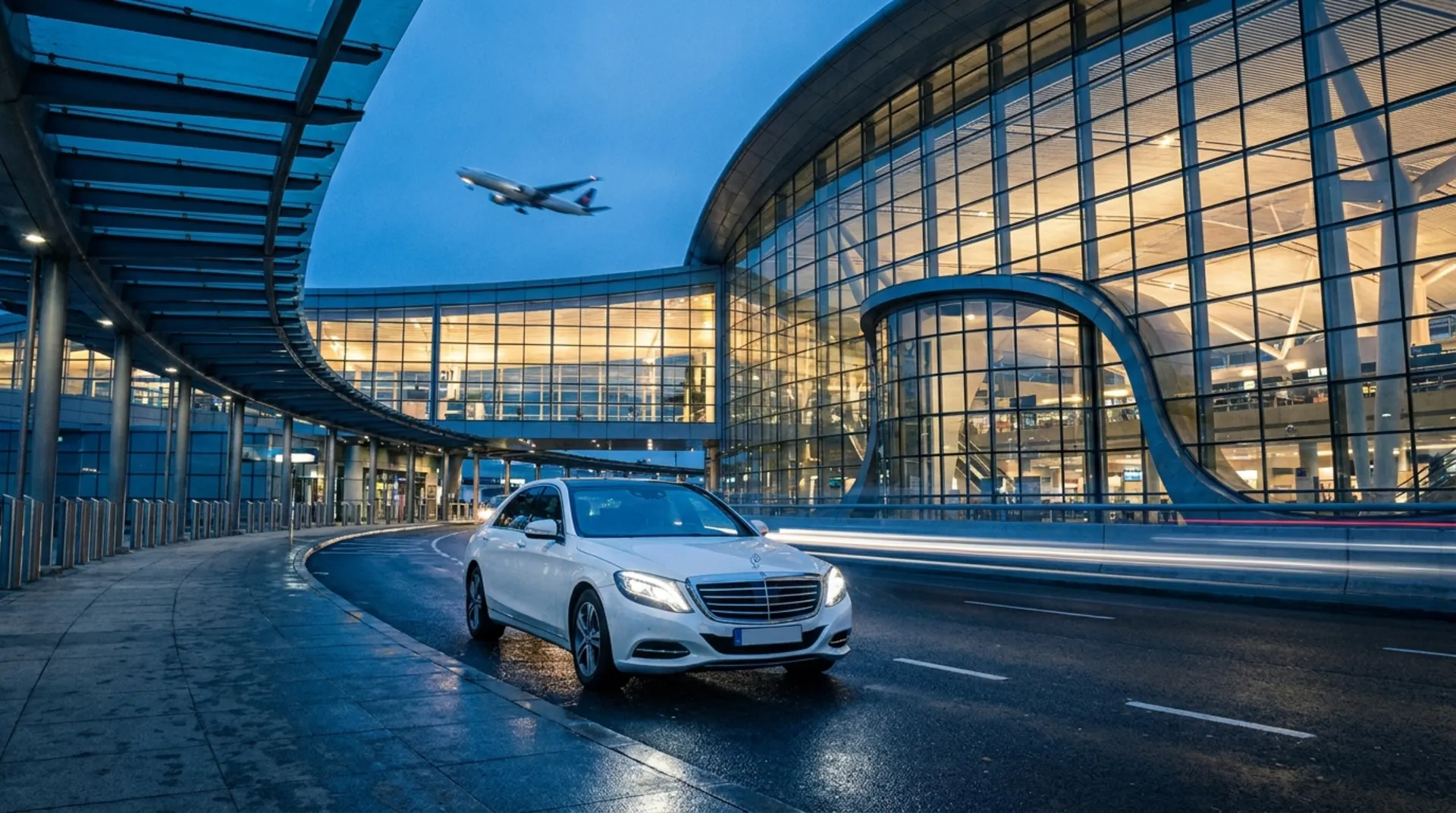 Cab waiting at an airport terminal at dusk with a plane taking off