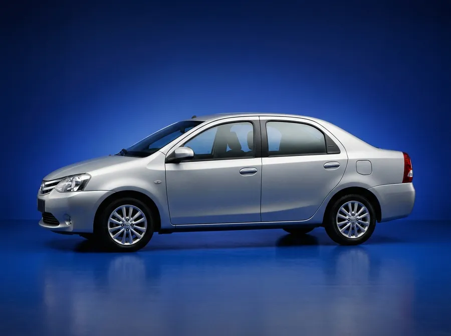 Silver Toyota Etios sedan cab, side profile